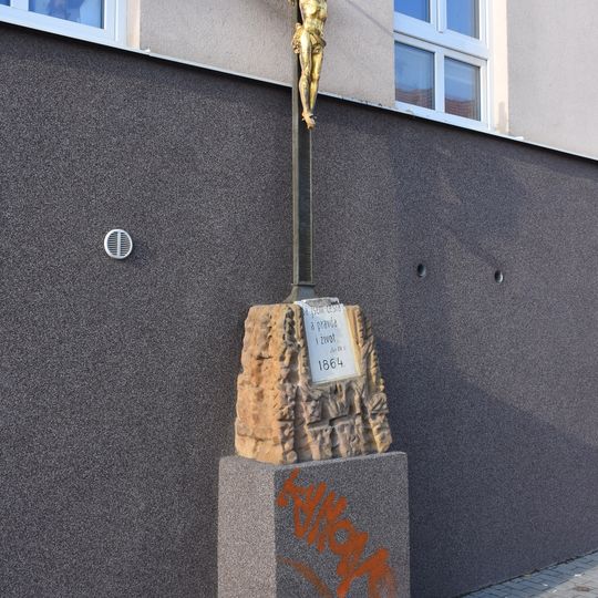 Wayside cross in front of former monastery of Sisters of Mercy of St. Borromeo in Brno-Líšeň