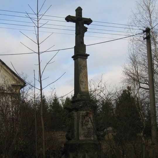 Kříž u místní komunikace v jižní části Stránské