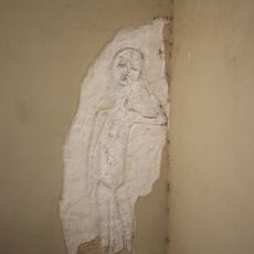 Plastika figury na domě Tiché náměstí 5