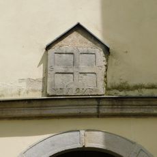 Křížový kámen I zazděný do věže kostela ve Stonařově