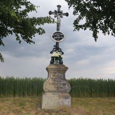 Kříž v zatáčce u Budkova