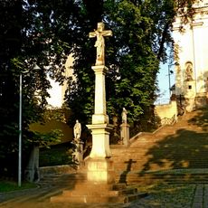 Kamenný kříž před kostelem svatého Bartoloměje v Napajedlech