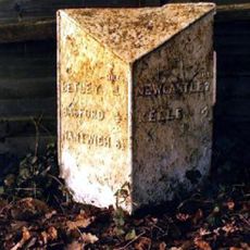 Milepost 50 Metres South Of The Hand And Trumpet Public House