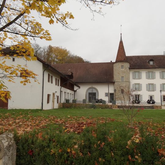 Salavaux château with portal and fountain