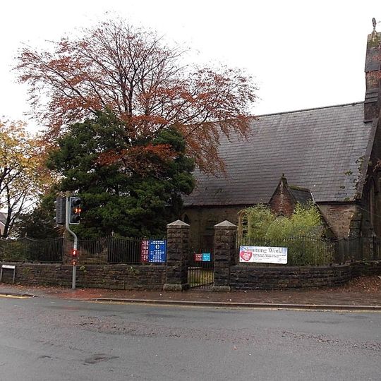 Church of St David, and surrounding churchyard railed wall.