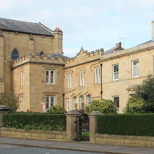 Dwarf Wall In Front Of Numbers 30 32 34 And St Patricks Roman Catholic Church