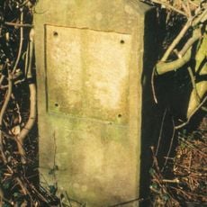 Milestone, S of Ardley Fields landfill - Manor Farm; 20m N of blocked off exit to old lay-by