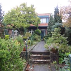 Twee middenstandswoningen onder 1 kap