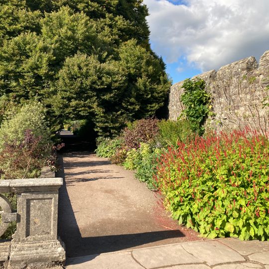 West wall of the Dutch Garden at St Fagans Castle with the battlement wall and watchtowers