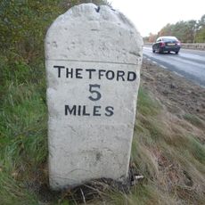 Milestone, 100m N of car park entrance