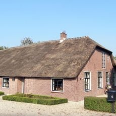Boerderij dwarshuis met riet gedekt