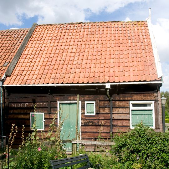 Perceelsgedeelte van een houten huis