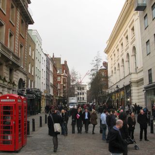 Two K6 telephone kiosks at the south end of James Street on the edge of Covent Garden