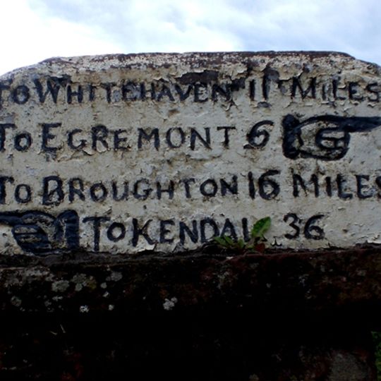 Milestone On Wall To North West Of High School House