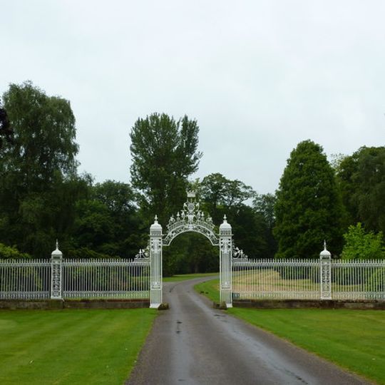 Gates and screen across the main approach to Cholmondeley Castle