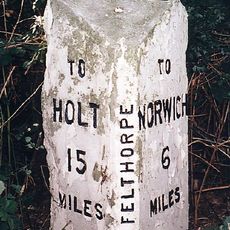 Milepost, 10m N of pull-in/layby