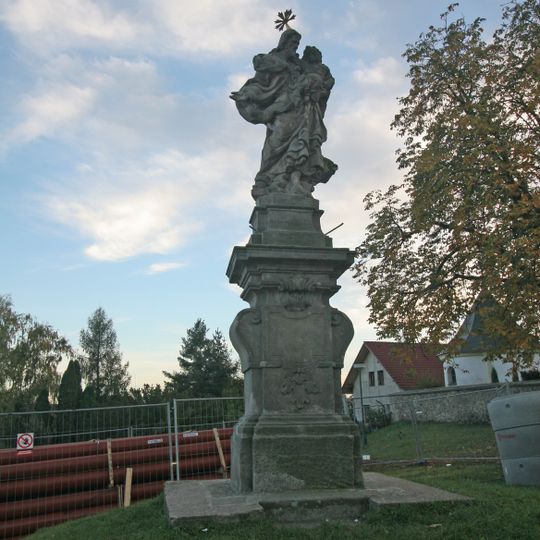 Statues of Saint Joseph and Jesus Christ as a baby in Osice