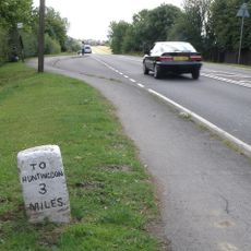 Milestone About 1/4 Mile South Of Village