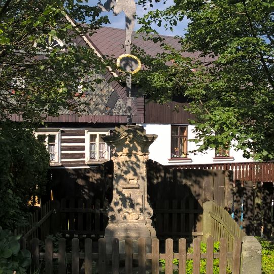 Wayside cross at the house no 66
