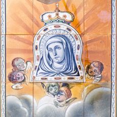 Ceramic panel of Our Lady of Miracles