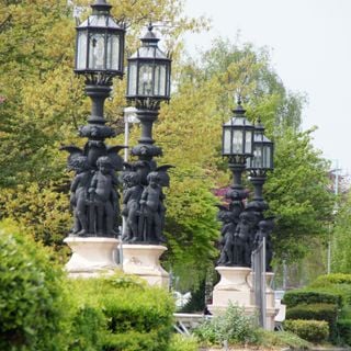 Four lamp standards with lanterns outside the main entrance to the Gillette Factory on the corner of Syon Lane (Great West Road)