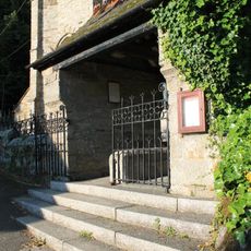 Lychgate And Attached Churchyard Walls To East And South Of Church Of St Gluvias