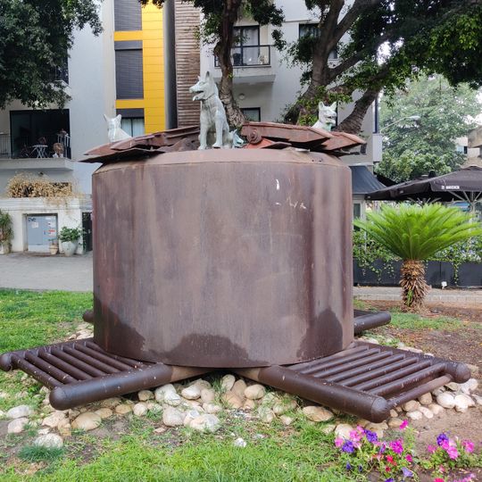 A Well and Four Dogs