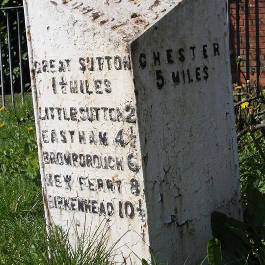 Milepost, Sutton Lodge, on NW corner of jct
