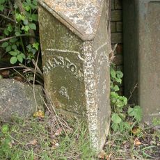 Milepost, Ludwell; E of village next to jcn Dennis Lane