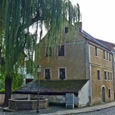 Straßen der Nikolaivorstadt mit Bürgersteigen und Granitpflasterungen sowie Stadtmauer der Vorstadt Bogstraße