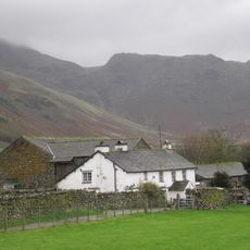 Wall End Farmhouse With Barns To South East And North