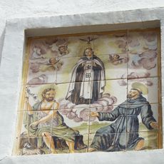 Ceramic panel of Saint John the Baptist, Saint Francis and Our Lady of El Remedio