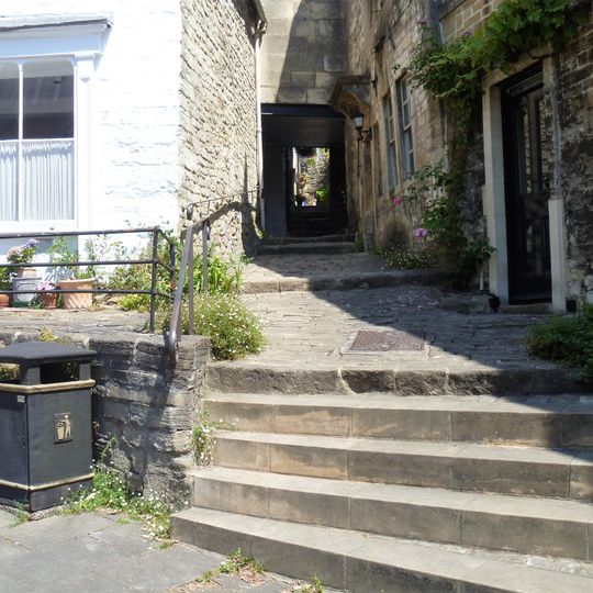 Section Of Elevated Pavement In Front Of No 21, Plus Wall Running To Left, And Steps With Pathway Leading North Between No 21 And Nos 23 And 24