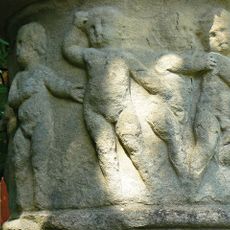 Urn circa 30 metres west of stable block at Painswick House