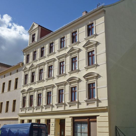 Mietshaus in geschlossener Bebauung, mit Laden mit originaler Front Rothenburger Straße 11
