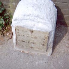 Milestone, Main Road, by No. 134, "Milestone", W of Social Club