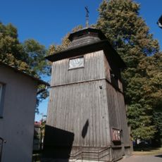 Wooden bell tower of Saint Nicholas church in Skała