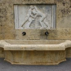 Courtyard fountain Munzinger schoolhouse / wrestlers
