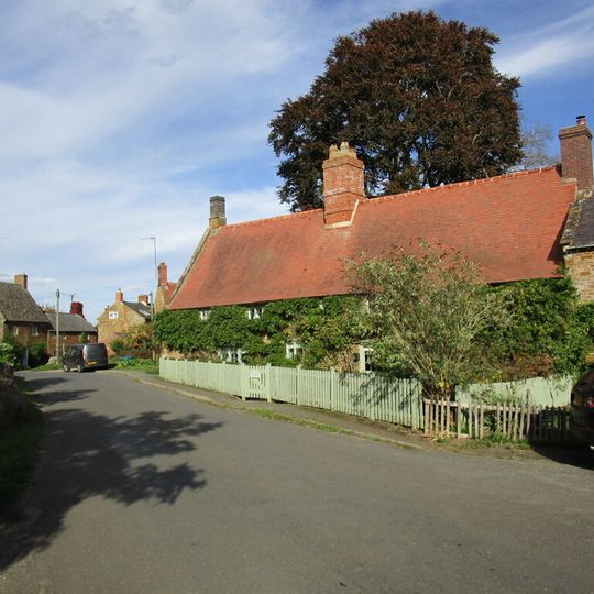 House Abutting And To Left Of Wisteria Cottage