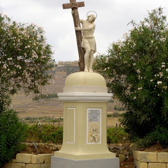 Statue of Christ embracing Cross and relief of the Madonna of Sorrows