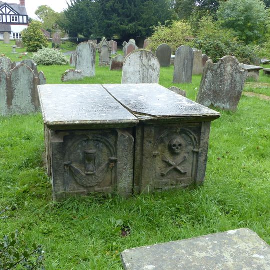 Pair of adjacent table tombs in churchyard