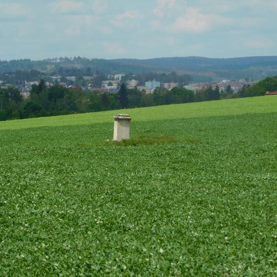Kříž v poli severně od Kosova