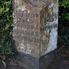 Milepost, opp. Bickerton Church, on cross roads