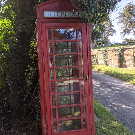 K6 Telephone Kiosk To South West Corner Of Village Green