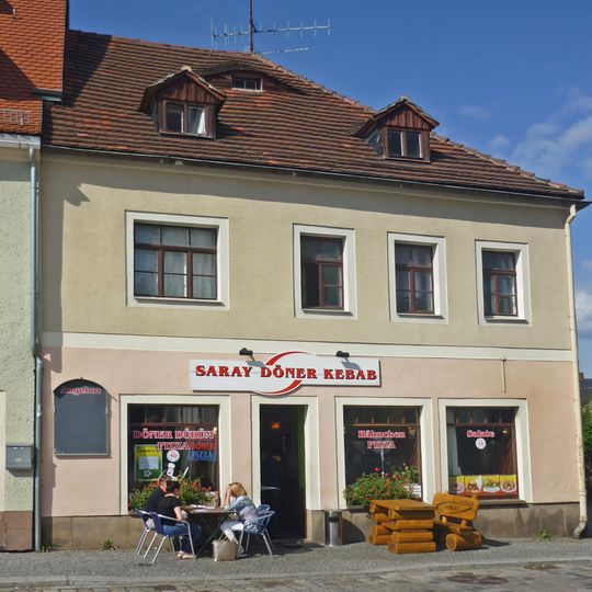 Wohnhaus in Ecklage und geschlossener Bebauung Badergasse 1