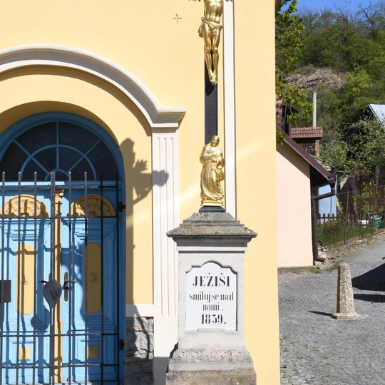 Wayside cross in front of the chapel of the Transfiguration