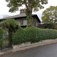 Garden wall, gates and railings at Ty'n y Lon
