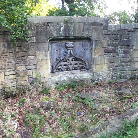 Garden wall incorporating 16th century panels