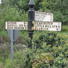 Signpost At Road Junction South Of Rock Farm