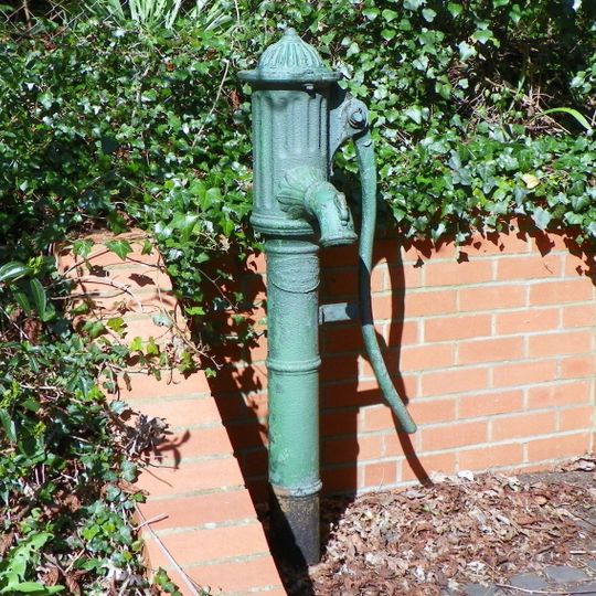 Public Pump On Verge In Front Of Number 10